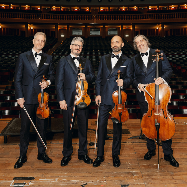 Chamber musicians holding instruments