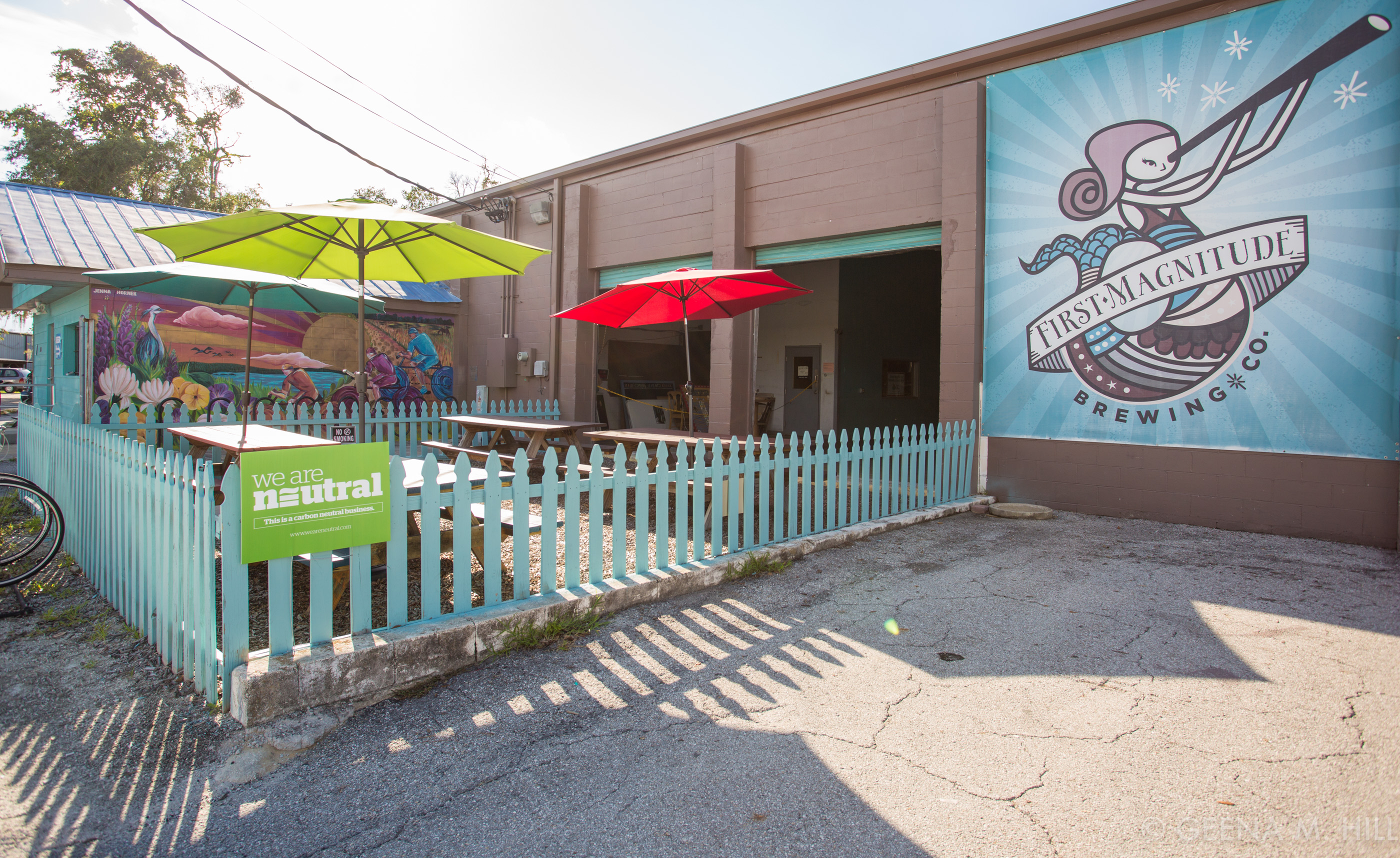 Mural and sign at First Magnitude Brewing Company