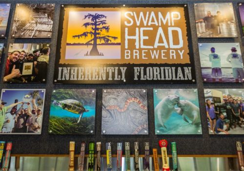 Taps and artwork at Swamp Head Brewery