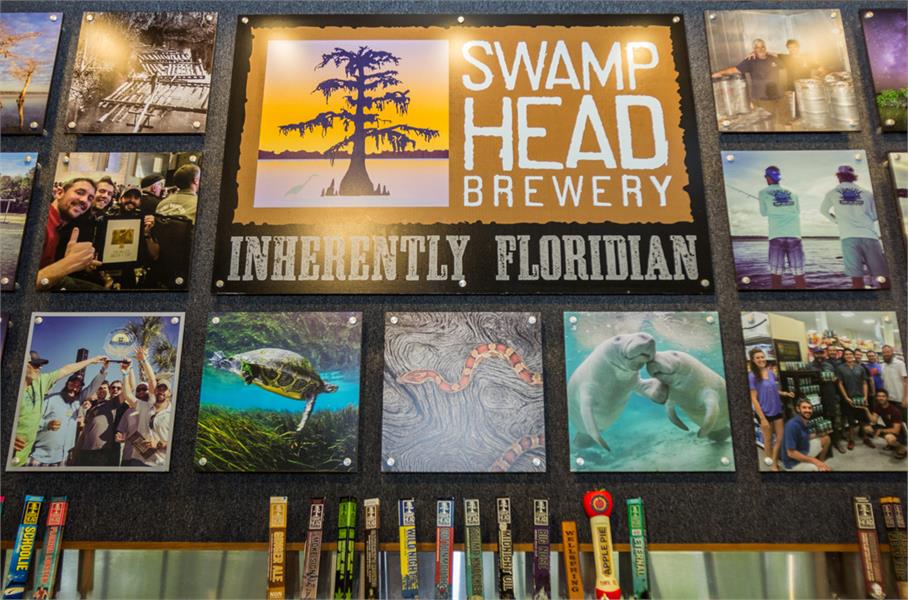 Taps and artwork at Swamp Head Brewery