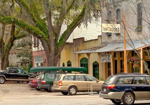 Cars parked in historic downtown micanopy