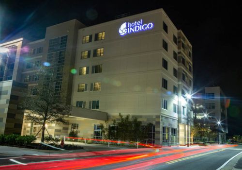 Exterior of Hotel Indigo in Gainesville at night