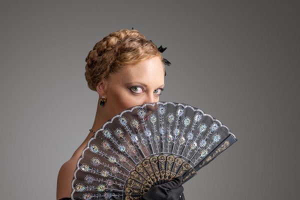 Dancer holding an antique fan