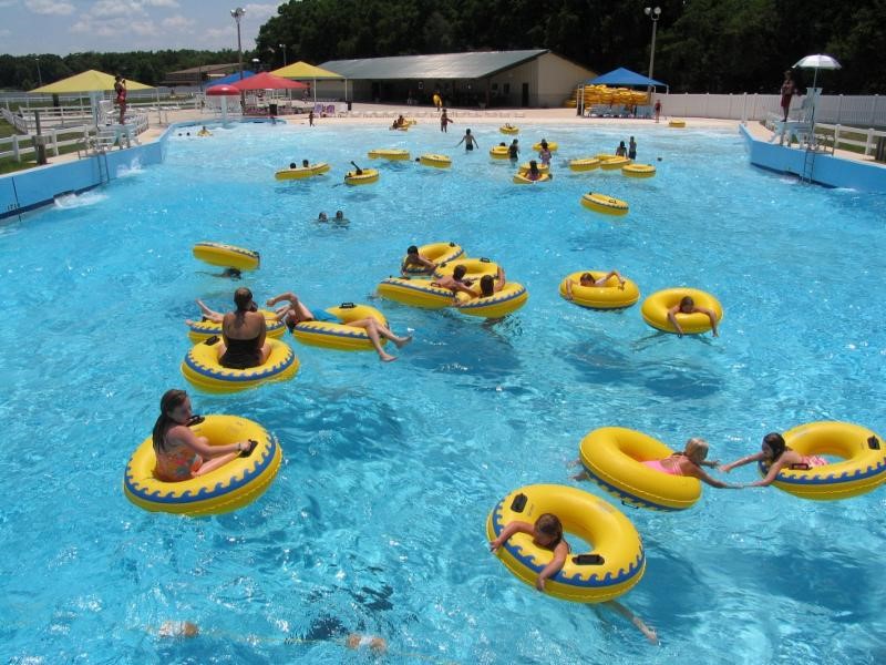 Swimmers in the wave pool at Kulaqua River Ranch