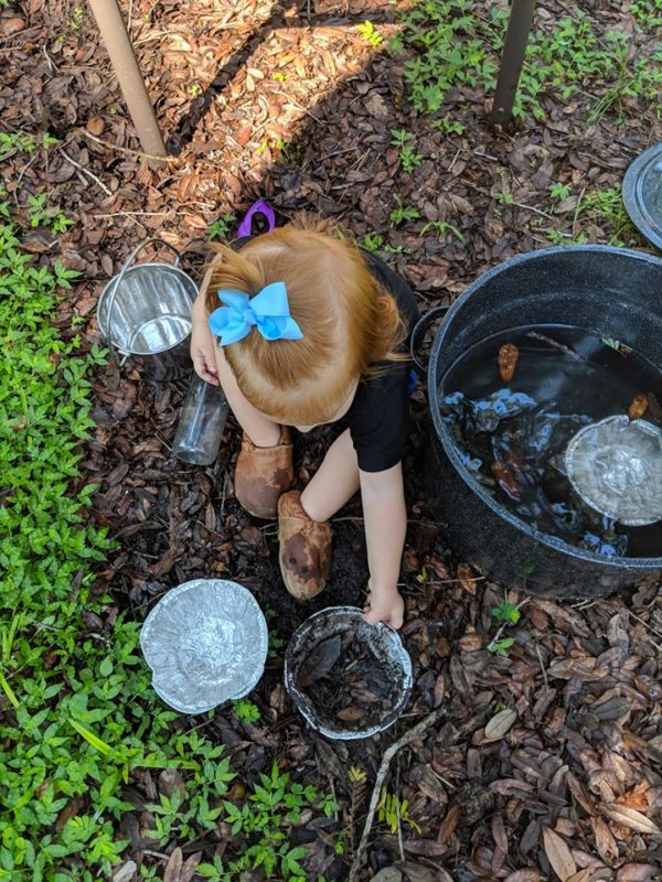 Child playing on the ground