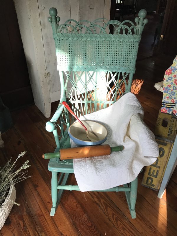 Vintage cooking items on a rocking chair