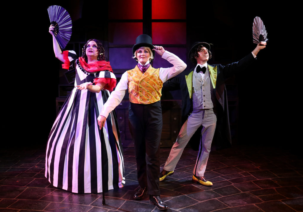 Actors on stage for Scrooge in Rouge
