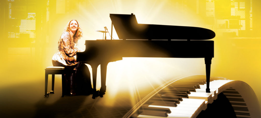 Glowing image of Carole King on the piano