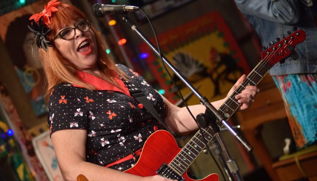 Blues artist Liz Mandeville on guitar