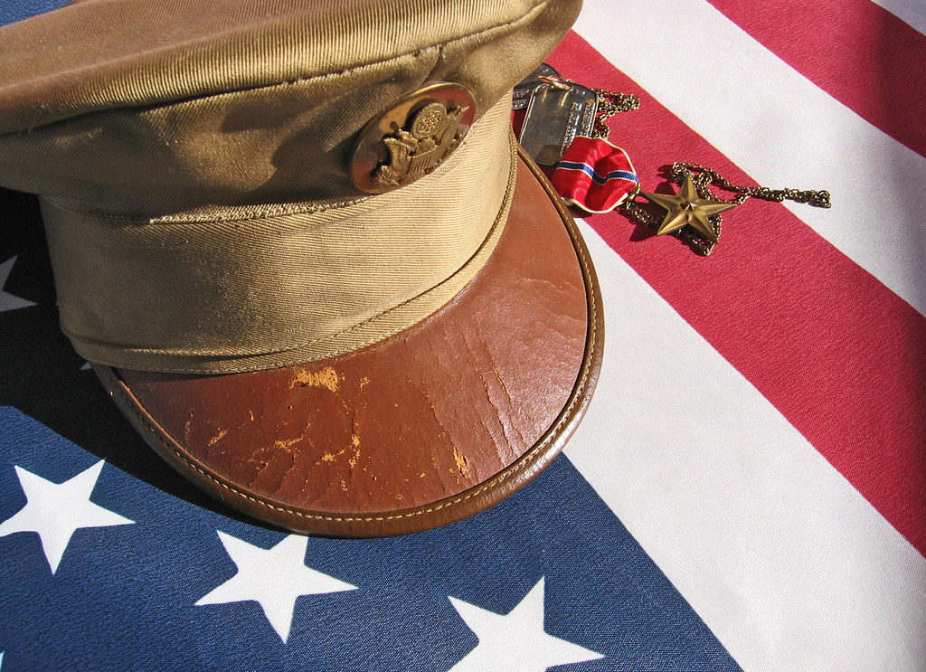 Veterans Day, hat and medals resting on a flag