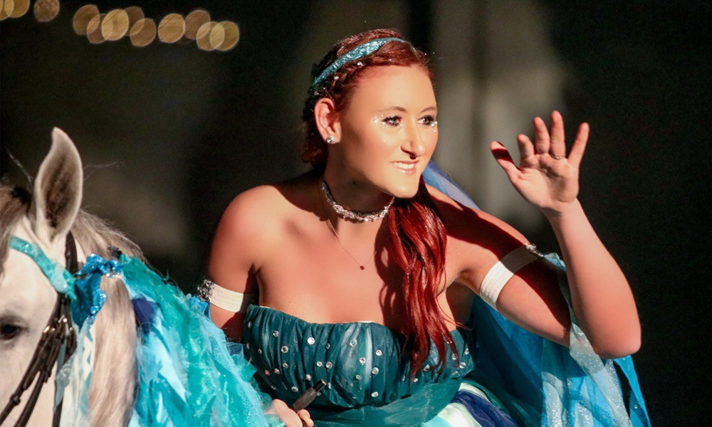 Performer in a magical costume on horse