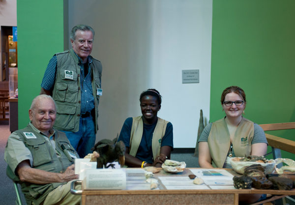volunteers at table