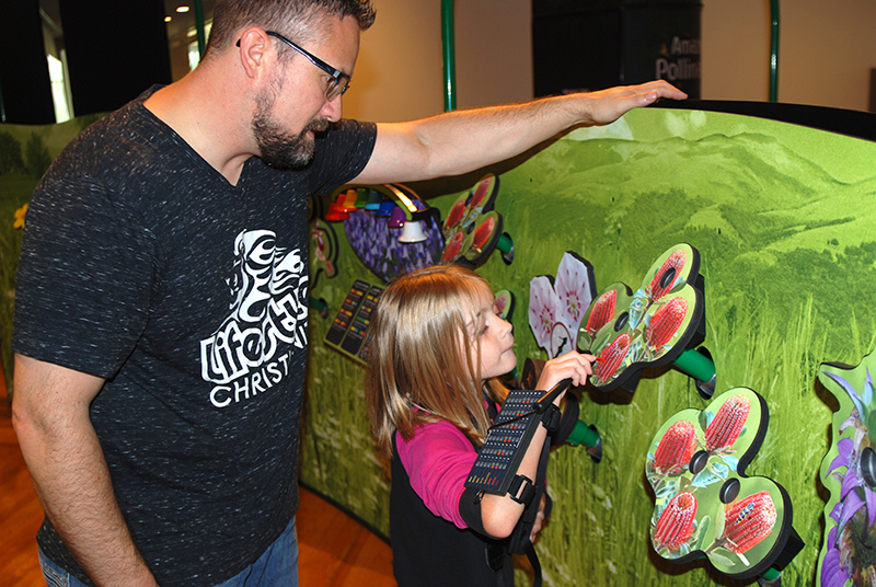 Family at Amazing Pollinators Exhibit