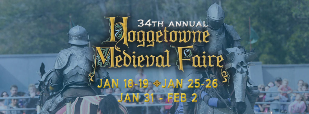 Armored knights jousting in front of a crowd. 34th Annual Hoggetowne Medieval Faire