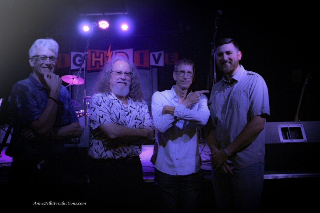 Band members in front of the stage at High Dive