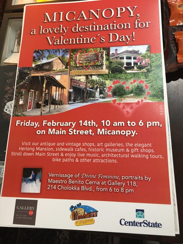 Poster for Valentines Day in Micanopy with photos of the historic buildings and shops and Herlong Mansion.