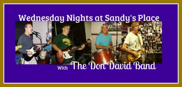 Don David and band members playing music