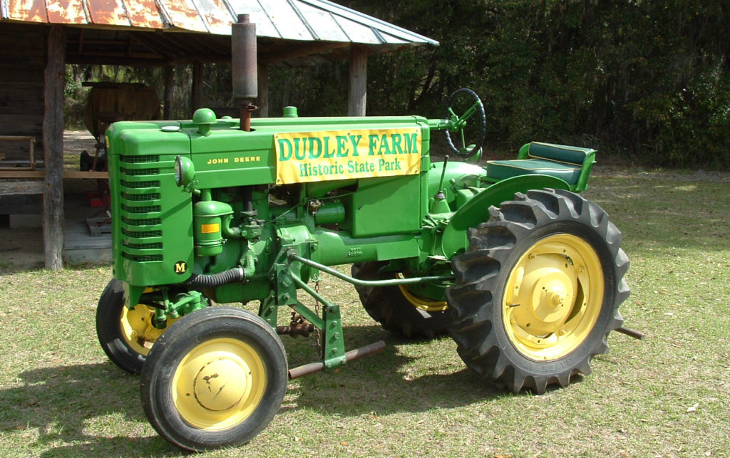 Old tractor in front of barn