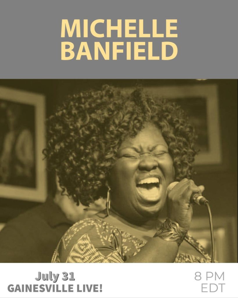 Blues vocalist Michelle Banfield singing in a microphone