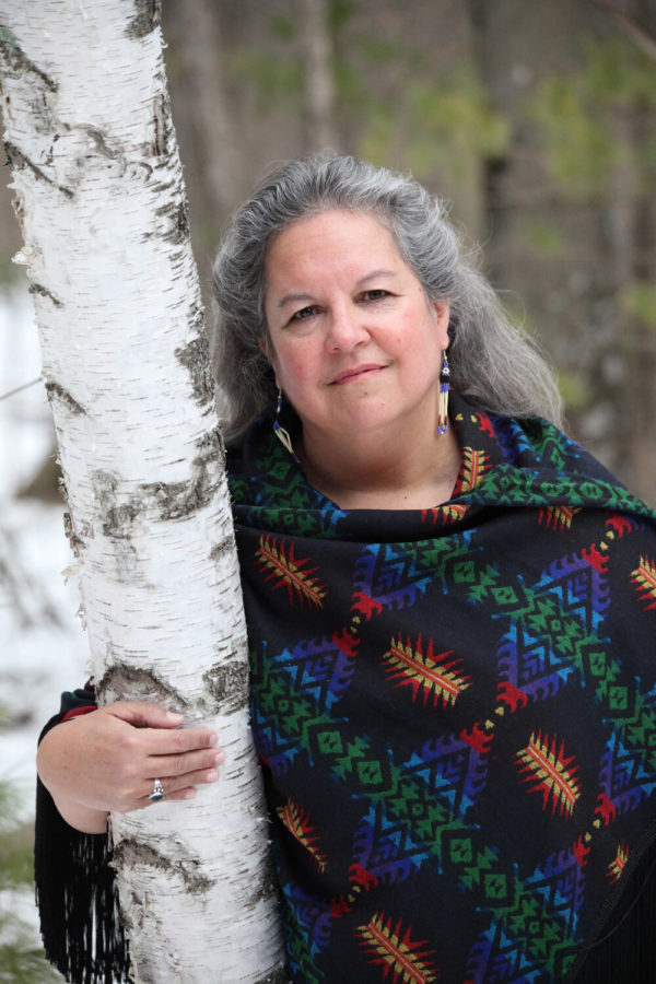 woman standing by tree