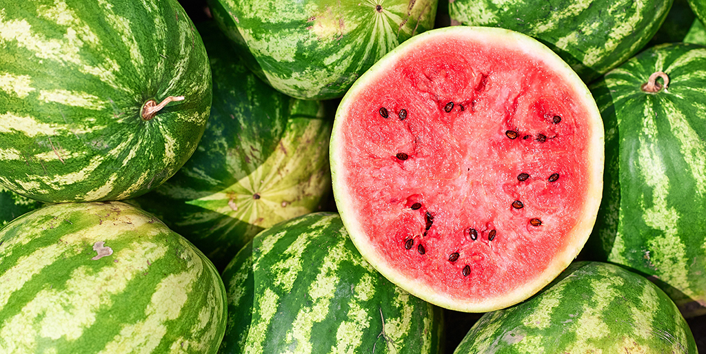 A red cut watermelon view from above.