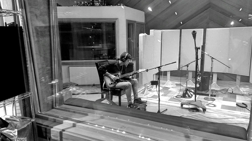 musician in recording studio