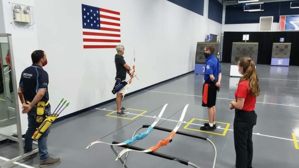 archer and instructor with bow