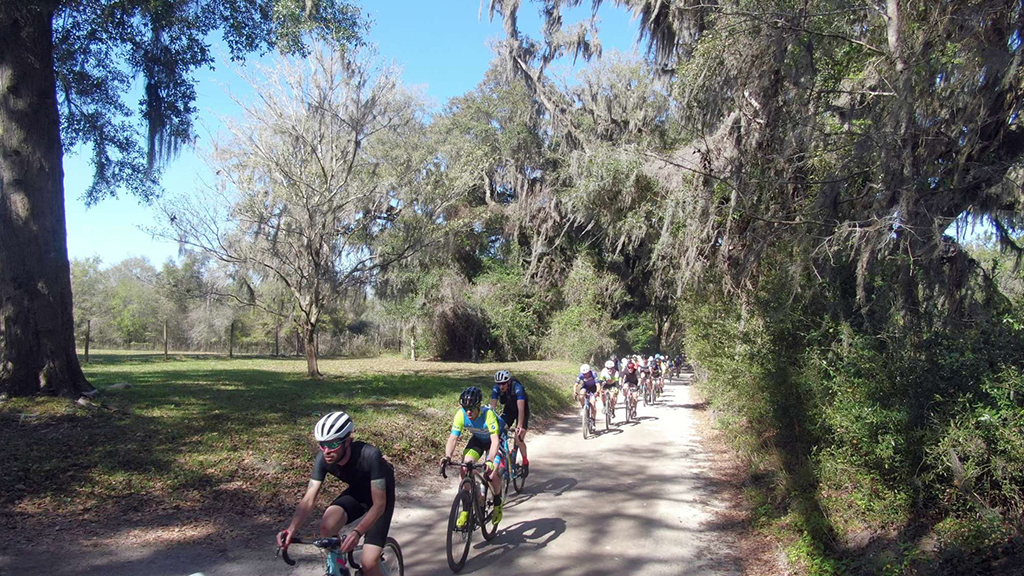bike riders on dirt road