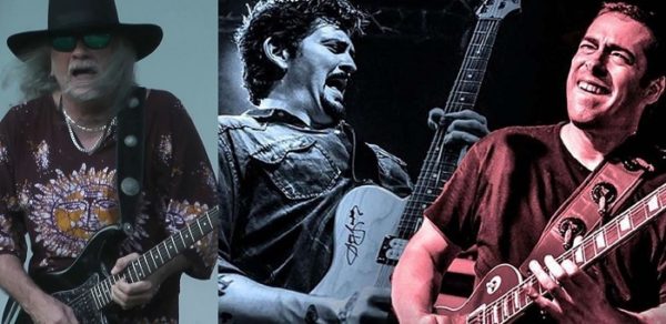 blues band members with guitars