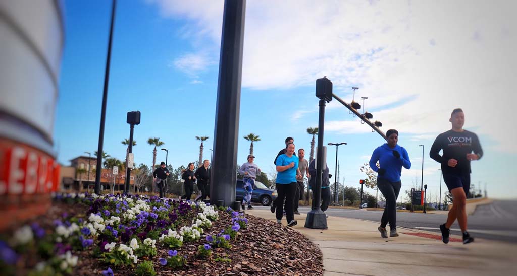 people runing at celebration  pointe
