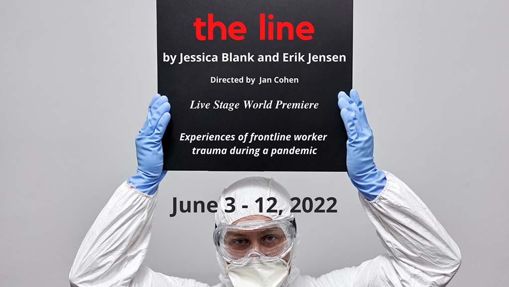doctor in PPP holding up sign reading the line