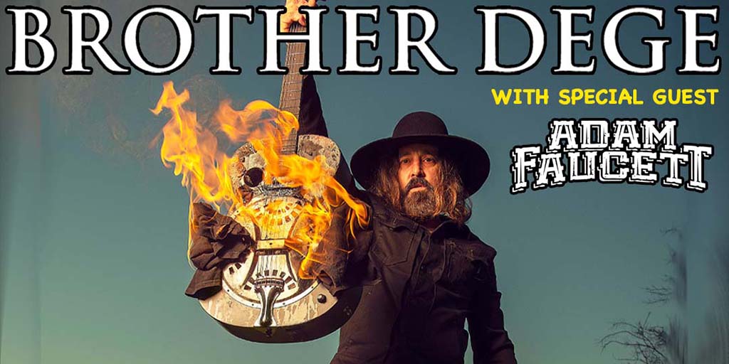 brother dege holding burning guitar