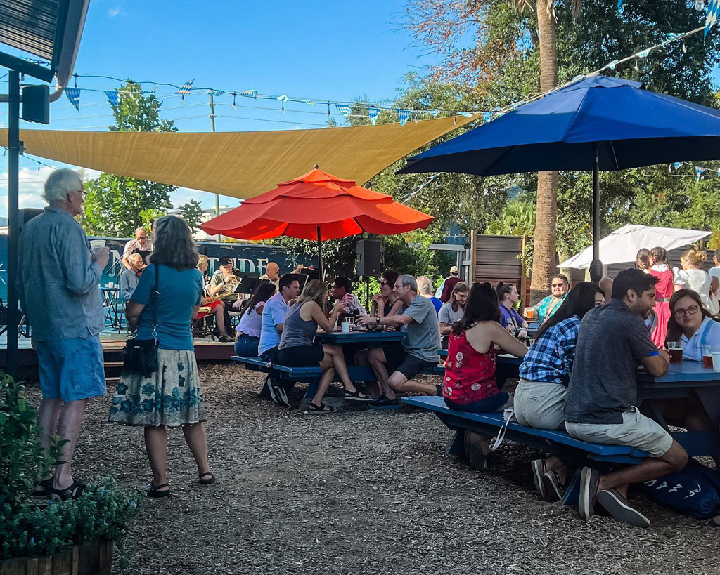 group of people at first magnitude brewing company