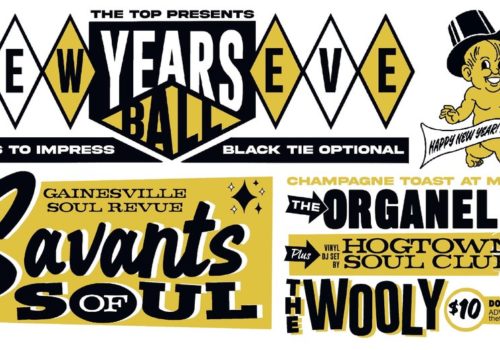 Horizontal banner with black and yellow lettering reading "The Top Presents: New Years Eve Ball, dress to impress, black tie optional." There is a baby in a top hat carrying a "'23" flag that reads "Happy New Year, 21+ only, champagne toast at midnight". The bottom of the banner shows the names of live music performers and reads, "featuring the Gainesville Soul Revue: Savants of Soul, The Organelles, plus Vinyl DJ Set by Hogtown Soul Club." The bottom right of the banner reads "The Wooly" and "$10, doors open at 8:30, advance tickets thetopsecretevents.com."