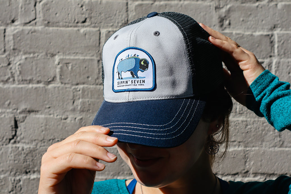 Sippin' Seven Alachua County Ale Trail trucker hat image with Billy the Bison and the Brew Birds logo