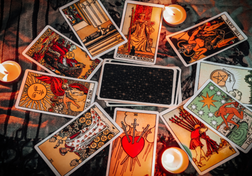 Tarot cards spread out across a table