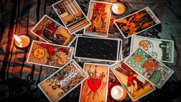 Tarot cards spread out across a table