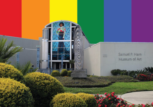 harn museum with rainbow colors in sky