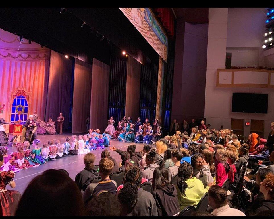 audience sitting on stage of the nutcracker
