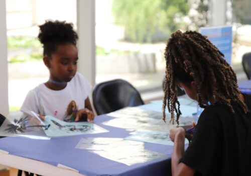 kids participating in art making activitiy