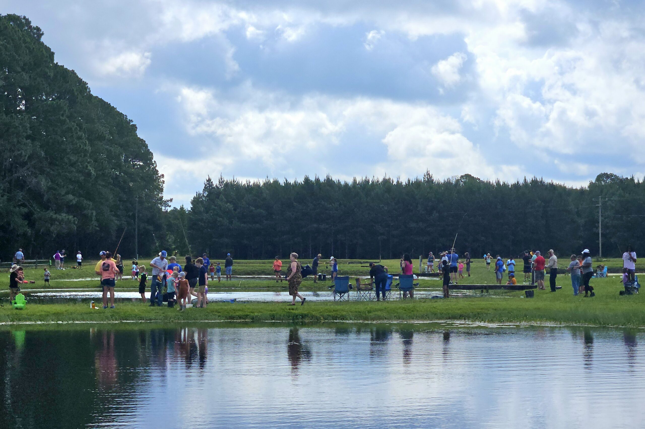 families fishing on at fishing ponds