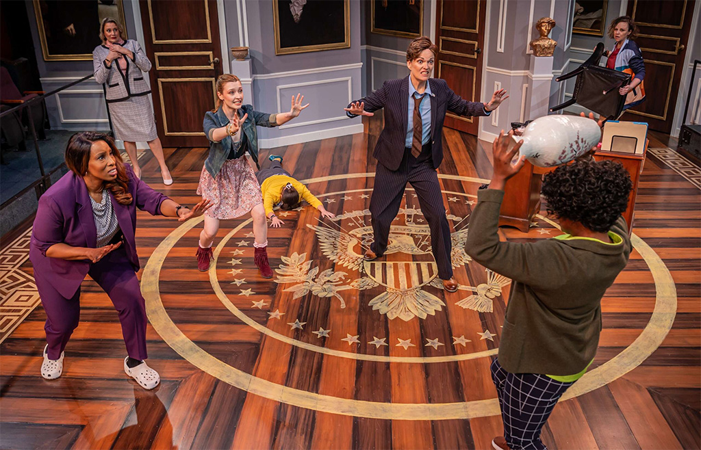 actors on stage on a set that looks like the oval office