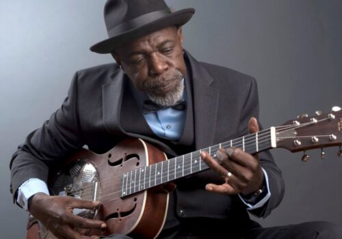 blues musician with guitar