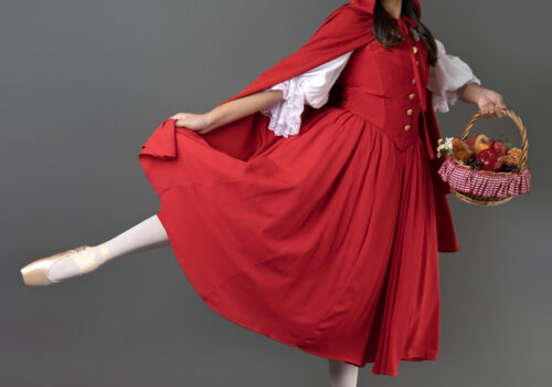 dancer in costume as little red riding hood