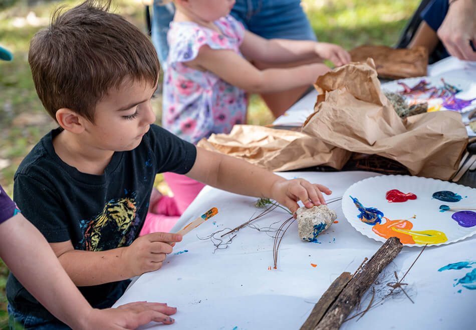 children participating with a hands-on activity