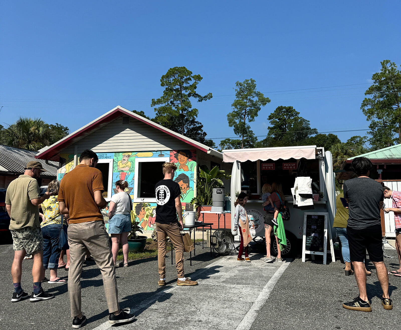 people at the auk market book and art faire