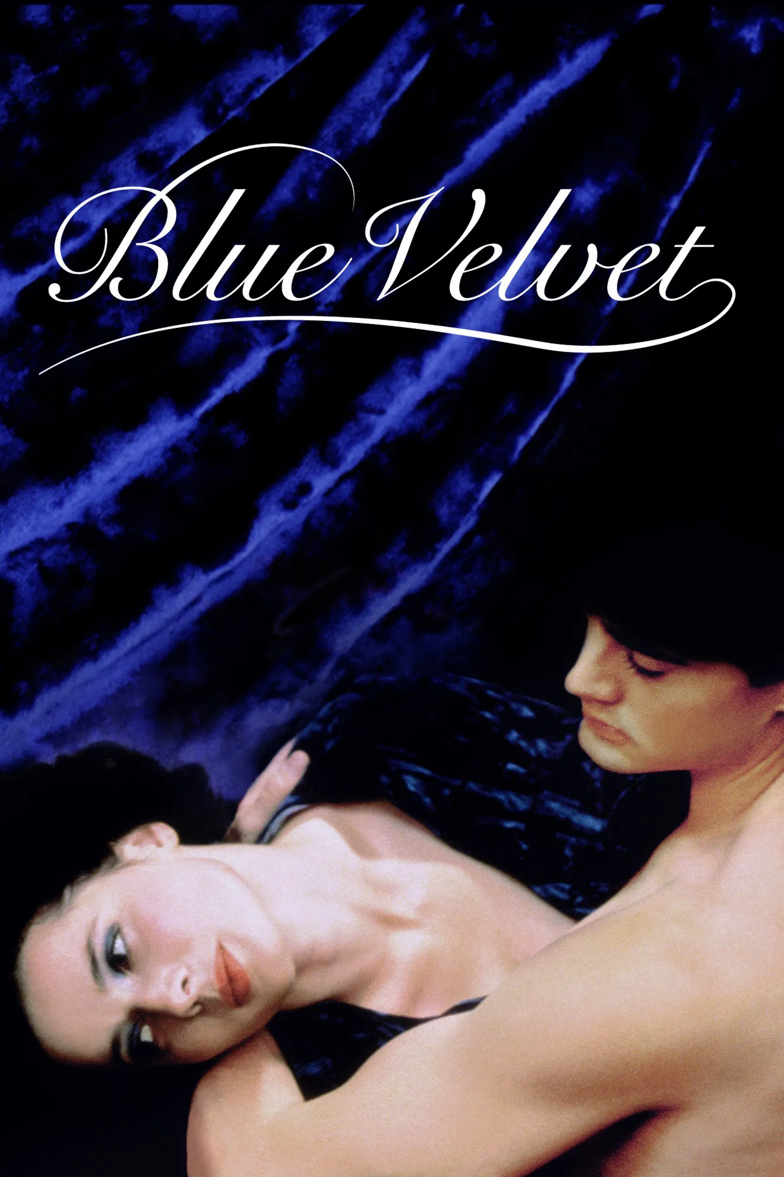 Blue Velvet Poster features a man and woman embracing each other