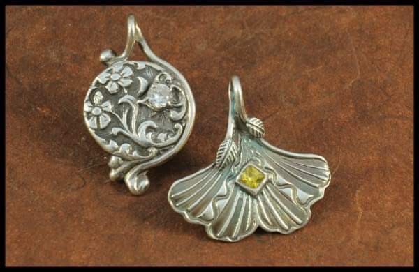 Trudy’s silver and clay pendants