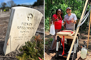 people working to clean a headstone