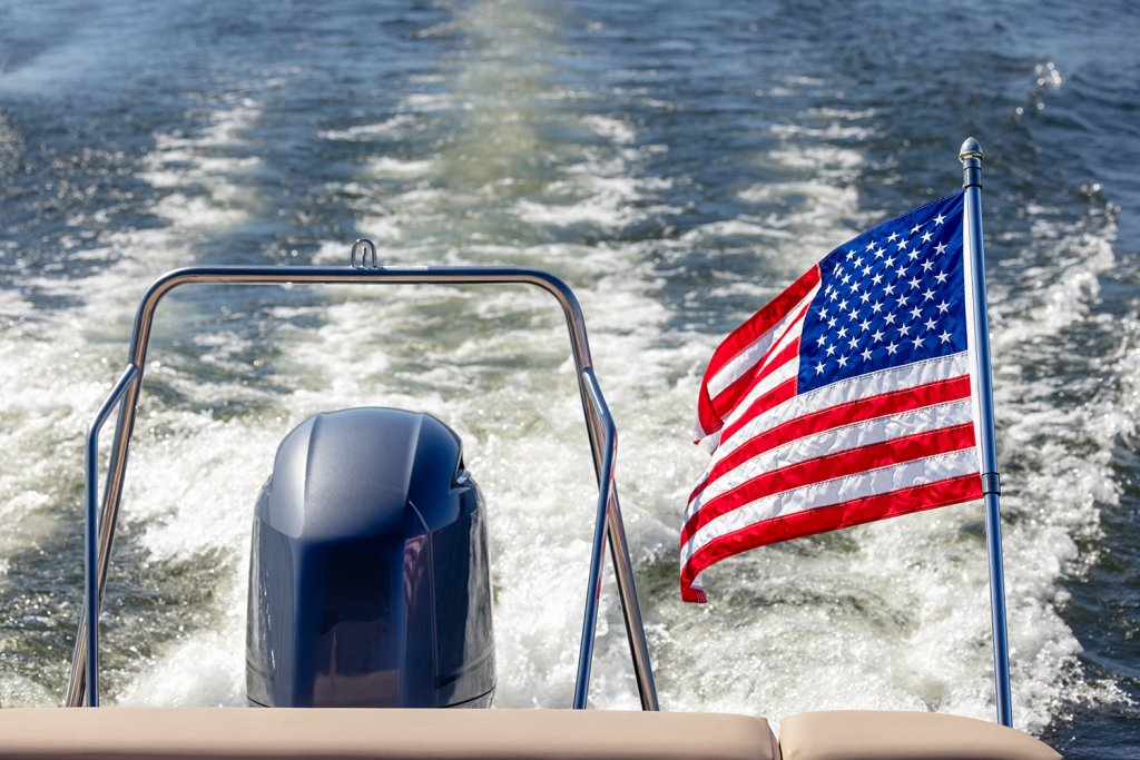 boat on a lake with a flag of the united states